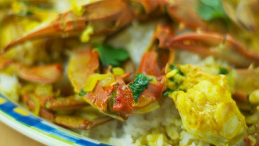 The Spice King’s Coconut Curried Crab Legs